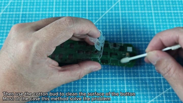 Clean button surface with cotton bud Clean button surface with cotton bud