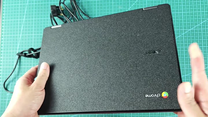Closed Acer Chromebook on green mat Closed Acer Chromebook on green mat