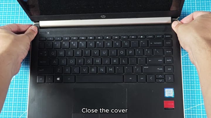 Closing HP laptop lid with stickers Closing HP laptop lid with stickers