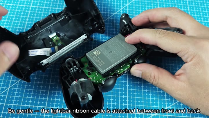 Disassembled controller revealing internal circuit board Disassembled controller revealing internal circuit board