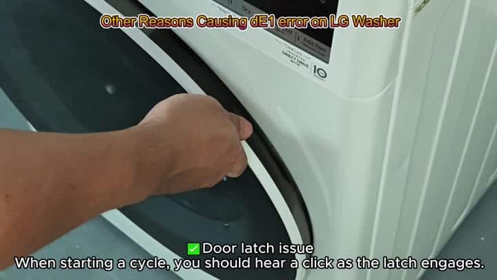 Door latch area near washer control panel Door latch area near washer control panel