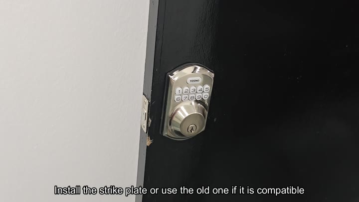 Electronic keypad deadbolt installed on black door Electronic keypad deadbolt installed on black door