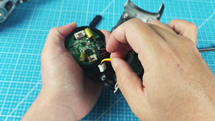 Exposed green circuit board internals Exposed green circuit board internals
