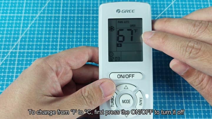 Gree remote screen showing 67 degrees Fahrenheit Gree remote screen showing 67 degrees Fahrenheit