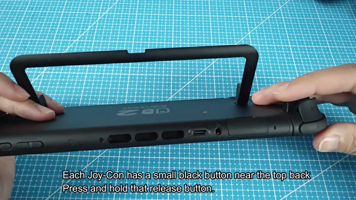 Hold release button to detach Joy-Con Hold release button to detach Joy-Con