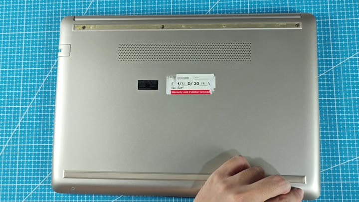 HP laptop bottom with warranty sticker HP laptop bottom with warranty sticker