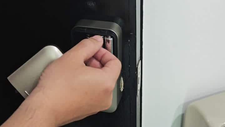 Inserting battery into smart lock Inserting battery into smart lock