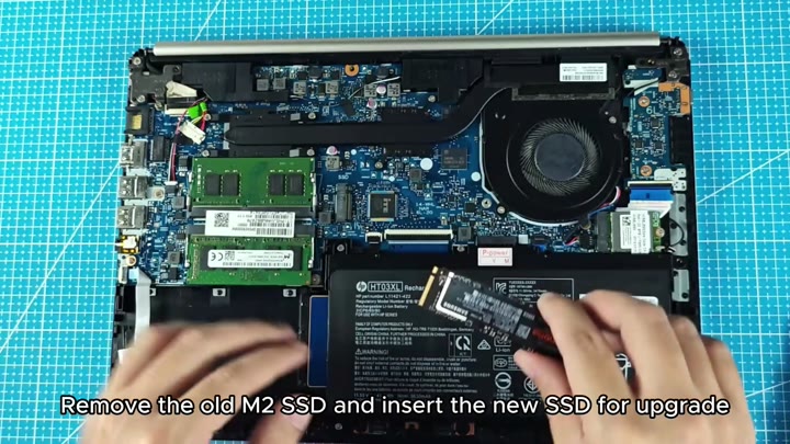 Inserting new M.2 SSD into slot Inserting new M.2 SSD into slot