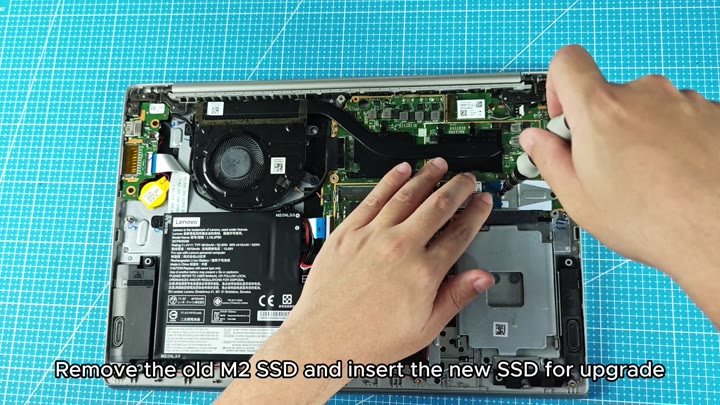 Installing new M.2 SSD with screwdriver Installing new M.2 SSD with screwdriver