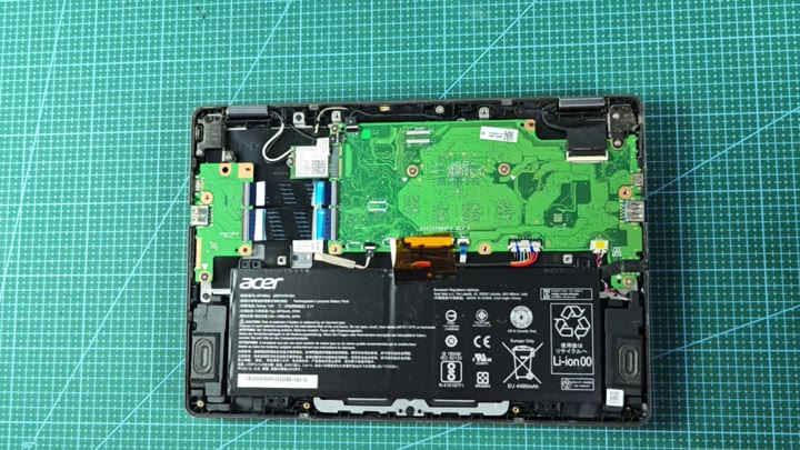 Internal motherboard and battery exposed Internal motherboard and battery exposed