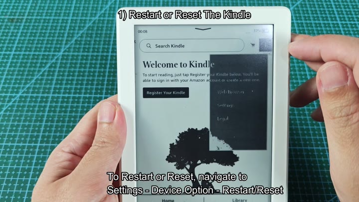 Kindle on green cutting mat Kindle on green cutting mat