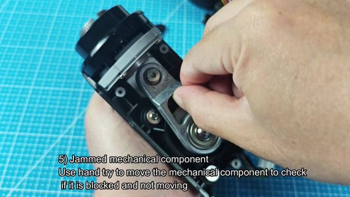 Manually moving jammed mechanical components inside Manually moving jammed mechanical components inside