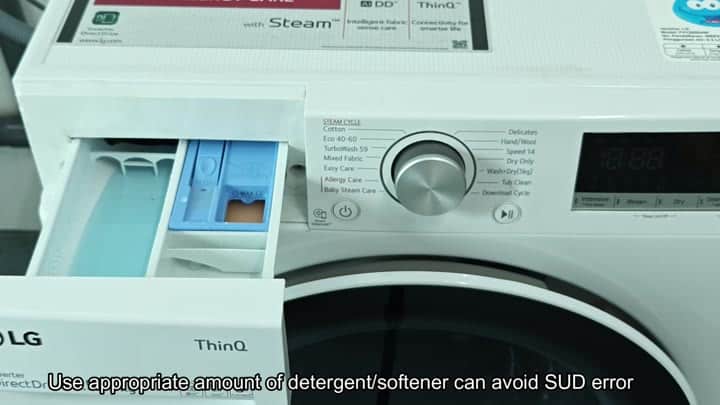 Open detergent drawer with max line Open detergent drawer with max line