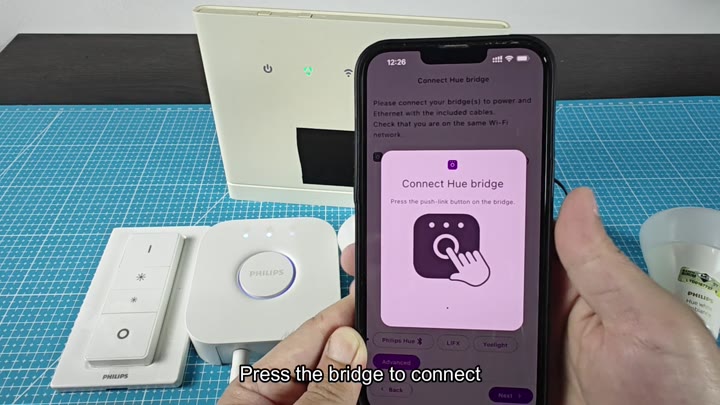 Pressing button on Hue bridge to connect Pressing button on Hue bridge to connect