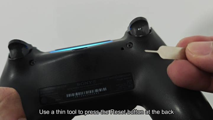 Pressing reset button with tool Pressing reset button with tool