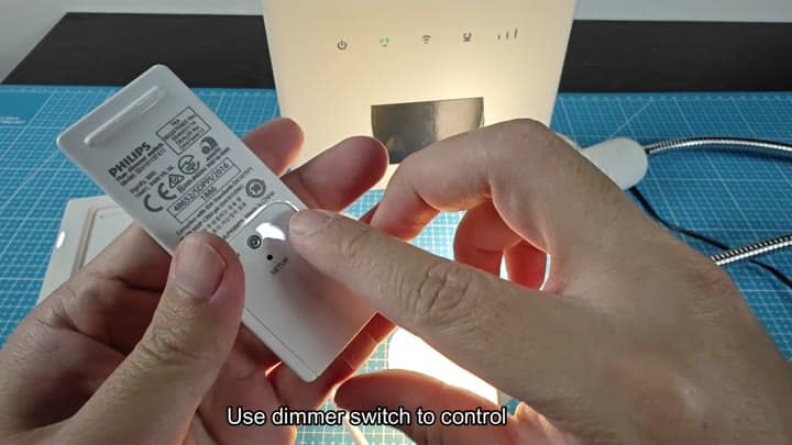 Pressing setup button on Philips dimmer switch Pressing setup button on Philips dimmer switch