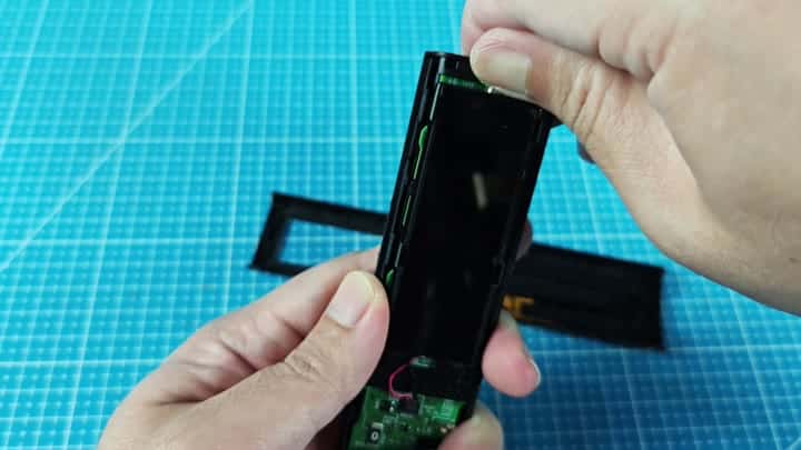 Prying open the plastic casing Prying open the plastic casing