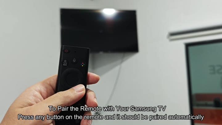 Remote near Samsung TV screen Remote near Samsung TV screen