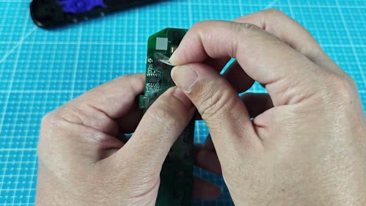 Removing adhesive from circuit board chip Removing adhesive from circuit board chip