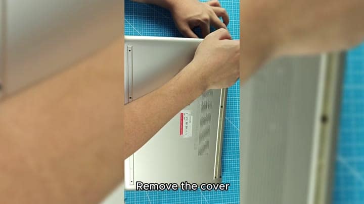Removing silver laptop rear panel Removing silver laptop rear panel
