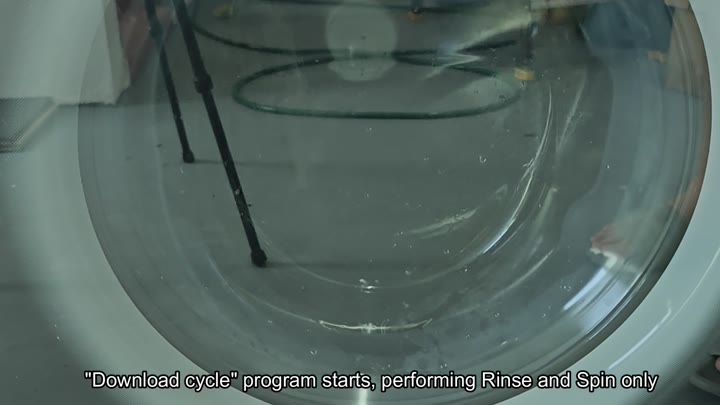 Washing machine drum with water inside Washing machine drum with water inside